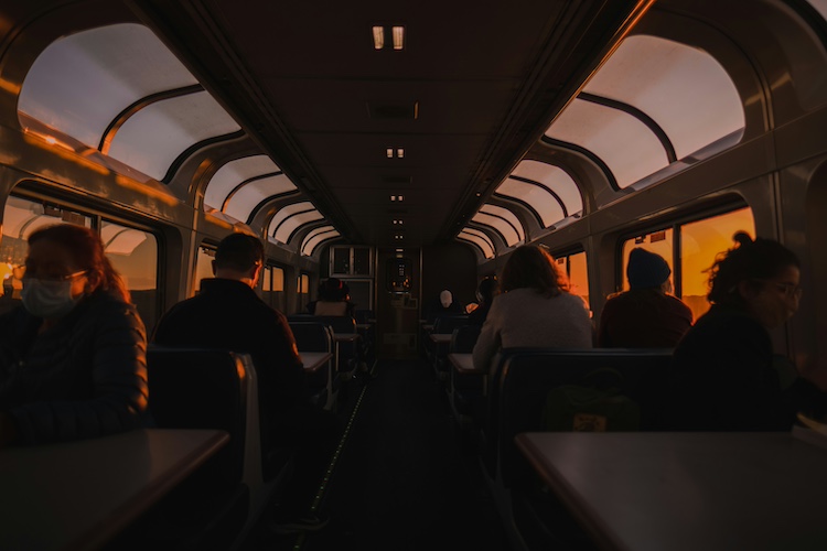 Passengers enjoy the view on an Amtrak train.